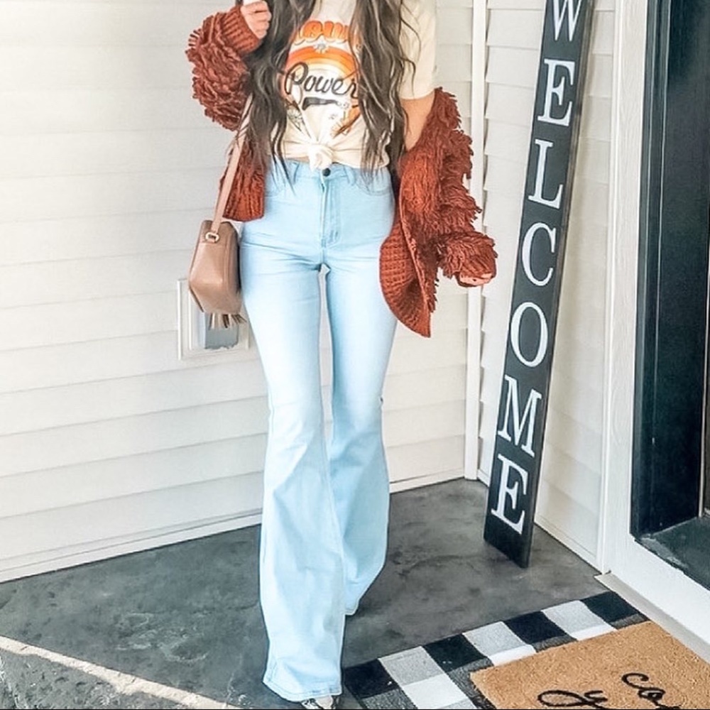 Stretchy flare jeans. Light wash denim super high waist Bell bottom. Really long